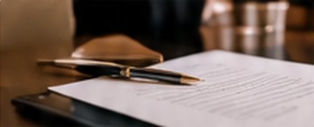 A document and pen ready for signing